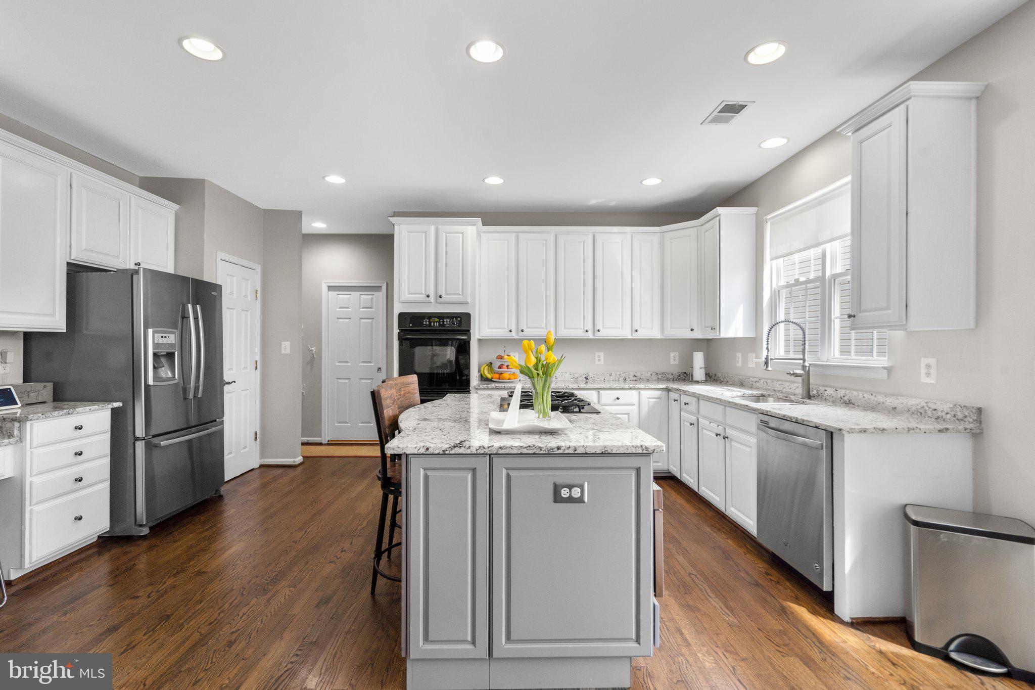 14334 Ashleigh Greene Road Boyds, MD 20841 - Photo 20 of 63 Updated Kitchen with Island & Table Space