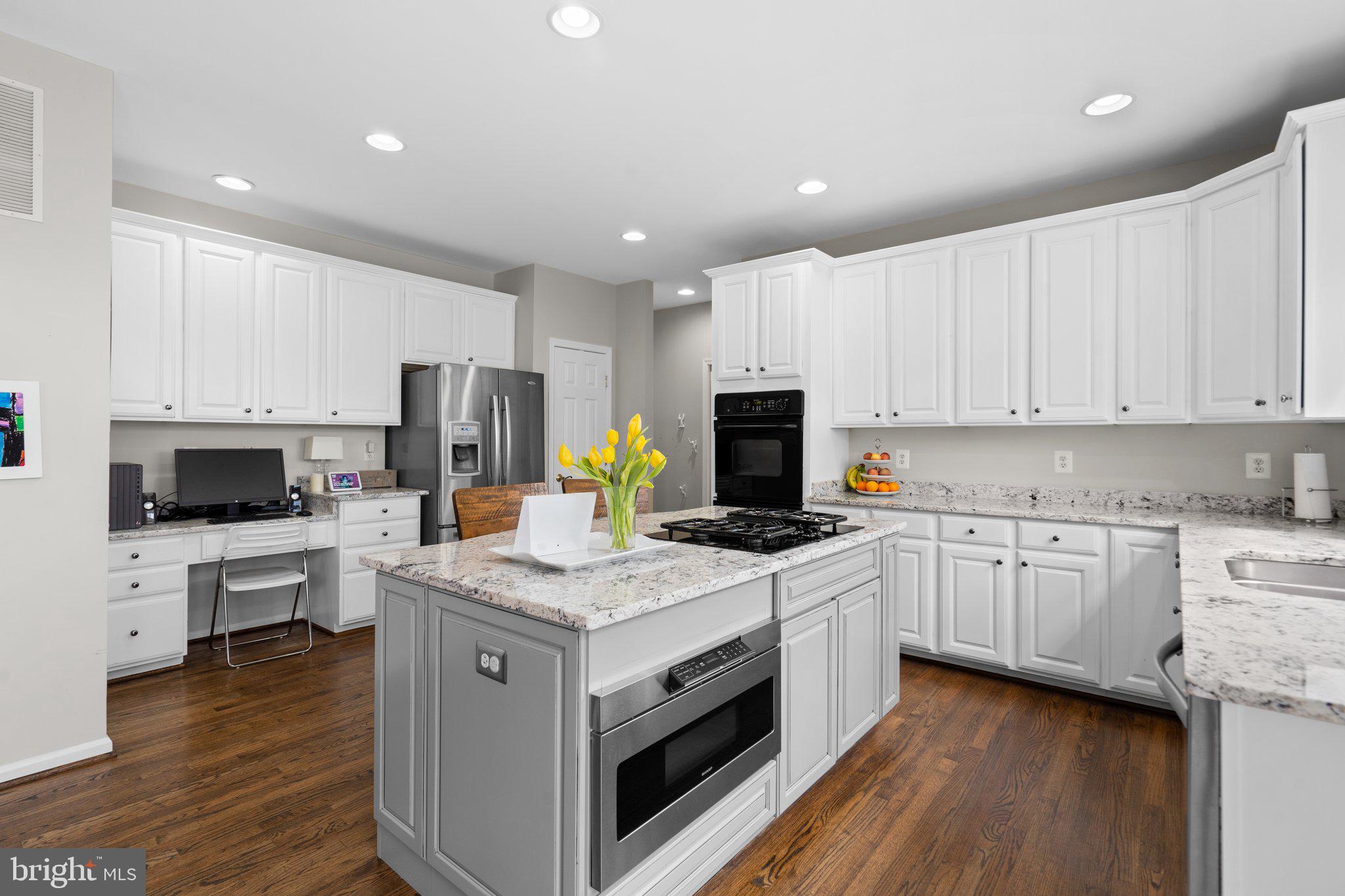 14334 Ashleigh Greene Road Boyds, MD 20841 - Photo 21 of 63 Updated Kitchen with Island & Table Space