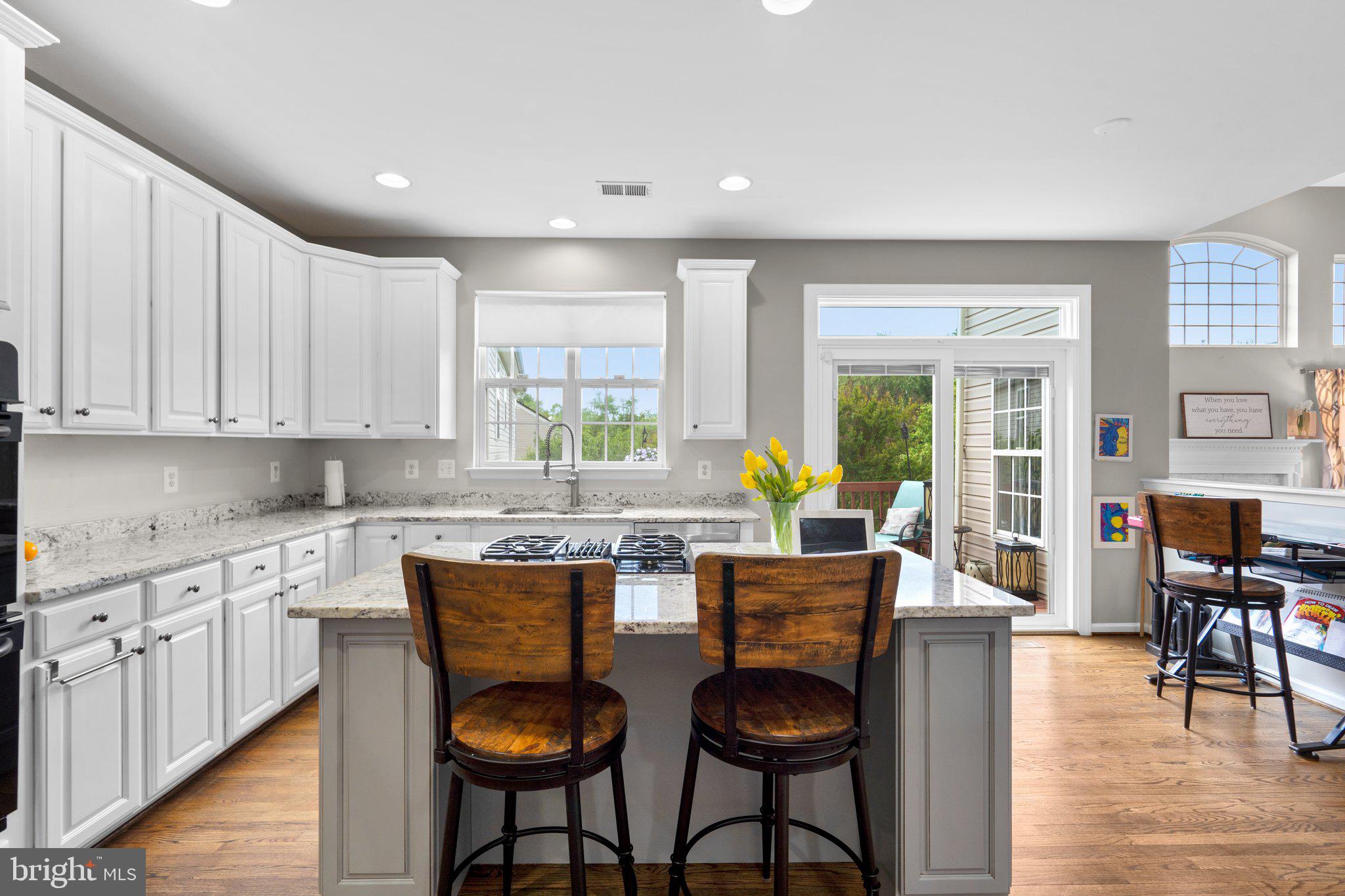 14334 Ashleigh Greene Road Boyds, MD 20841 - Photo 24 of 63 Updated Kitchen with Island & Table Space