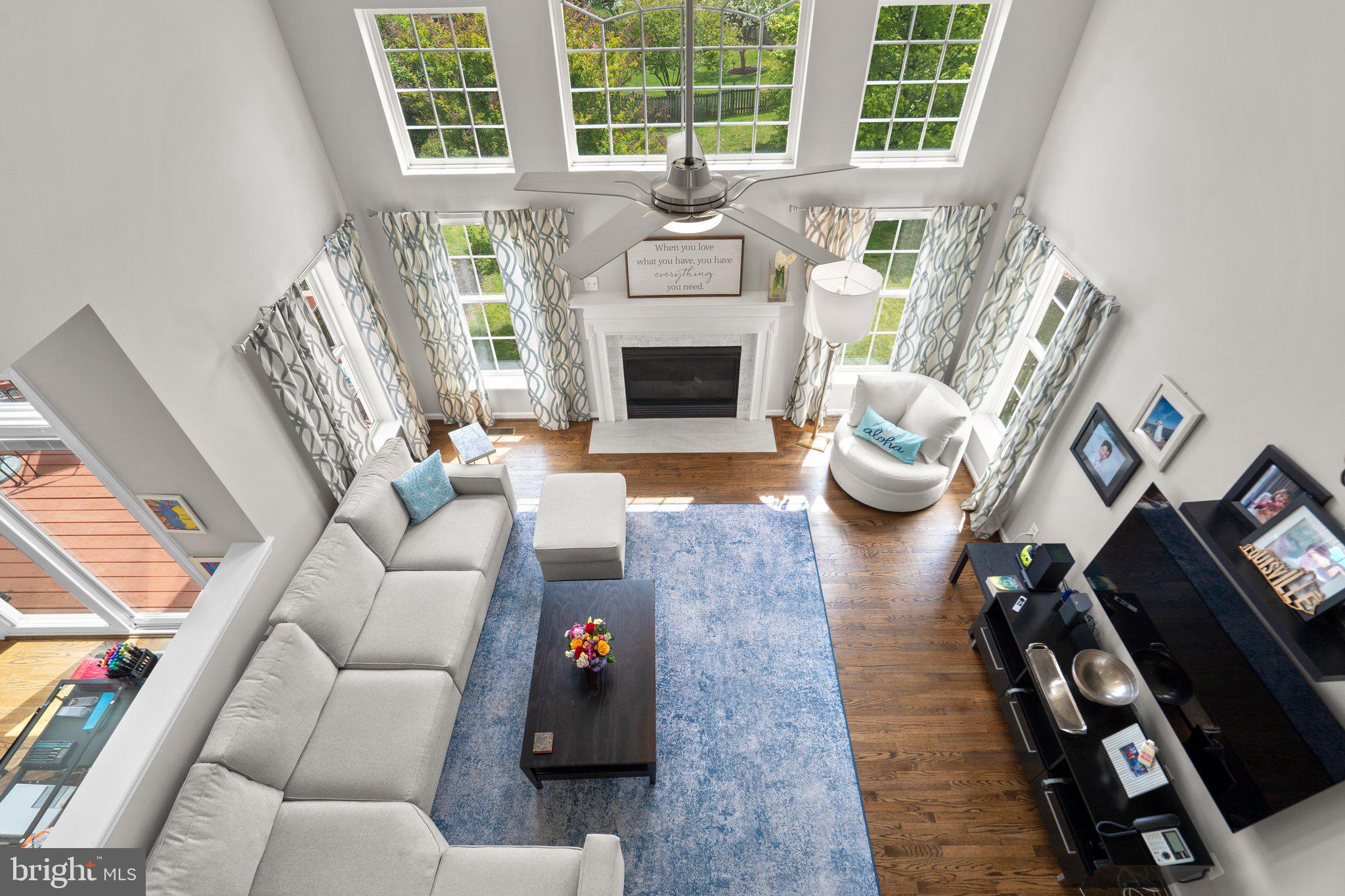 14334 Ashleigh Greene Road Boyds, MD 20841 - Photo 38 of 63 Family Room w/ Vaulted Ceilings & a Gas Fireplace