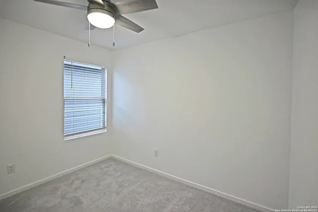 a view interior of a house and chandelier fan