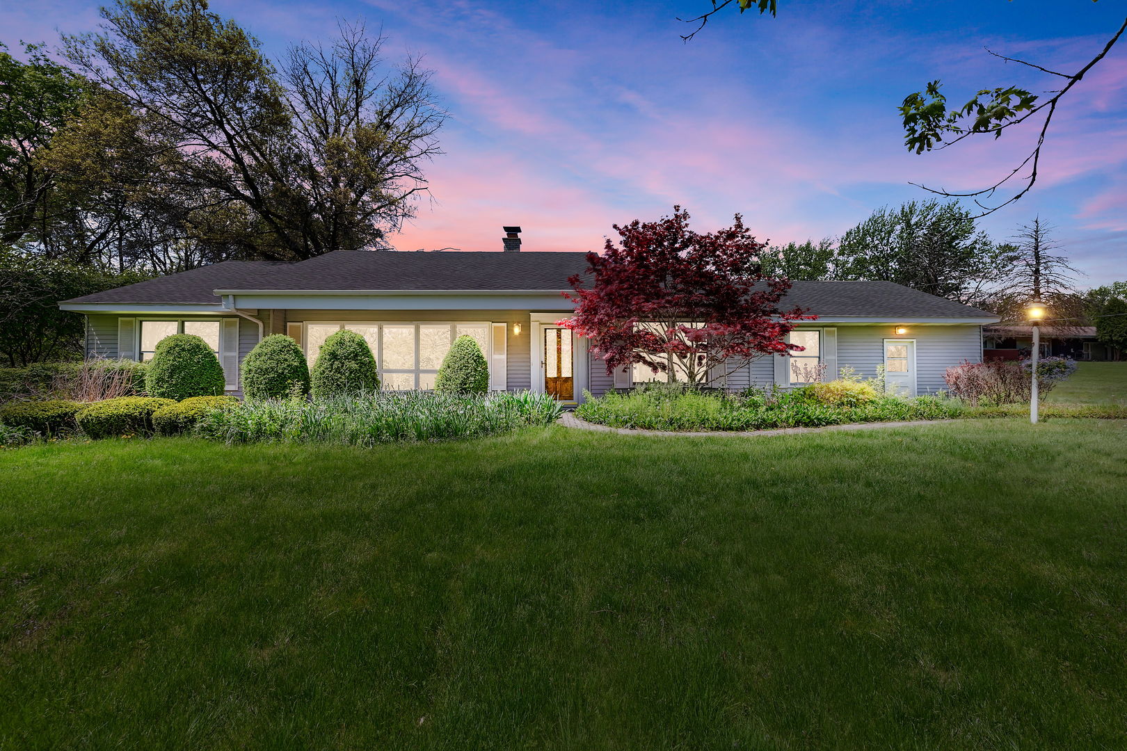 18054 South Parker Road Mokena, IL 60448 - Photo 1 of 21 a front view of a house with garden