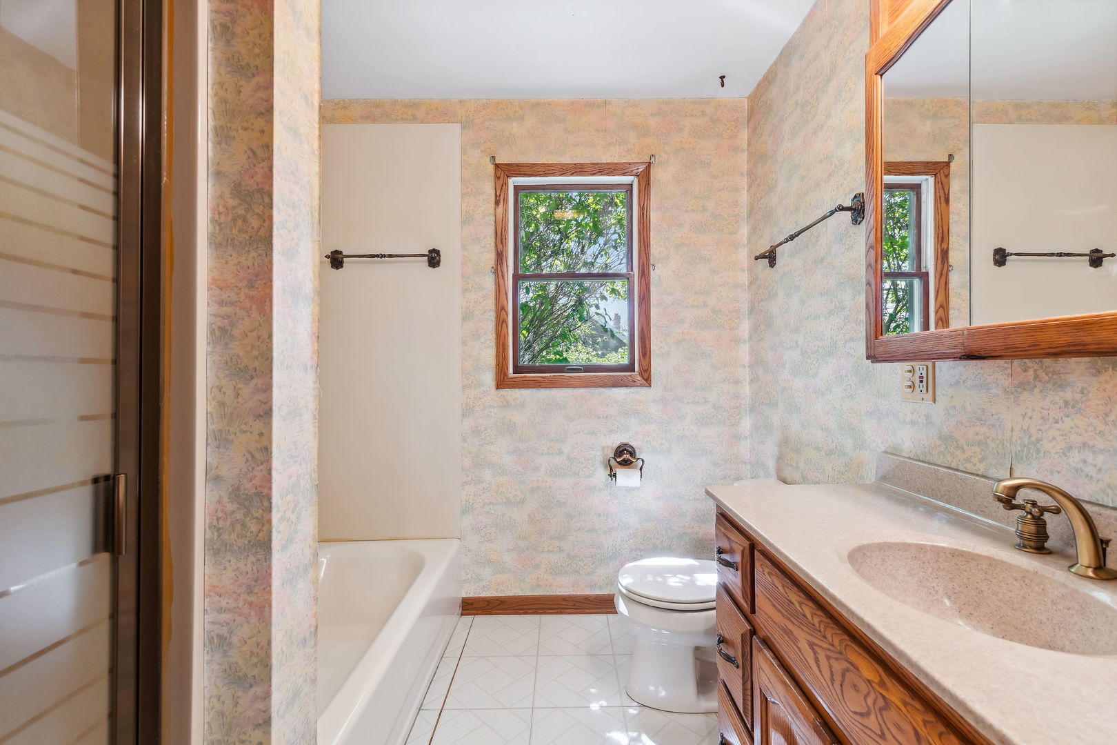 18054 South Parker Road Mokena, IL 60448 - Photo 16 of 21 a bathroom with a granite countertop toilet a sink and a bathtub