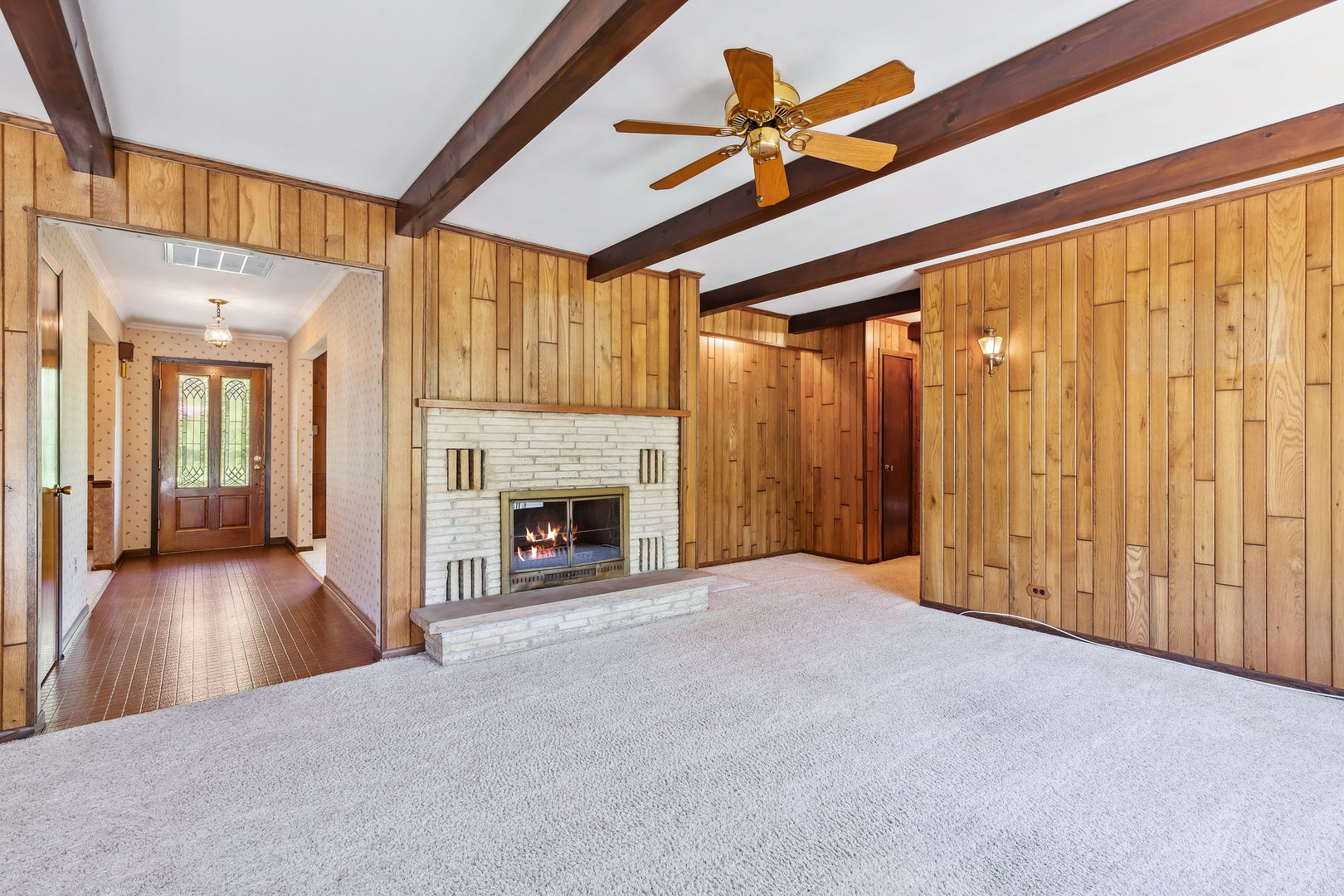 18054 South Parker Road Mokena, IL 60448 - Photo 9 of 21 a view of an empty room with a fireplace and a window