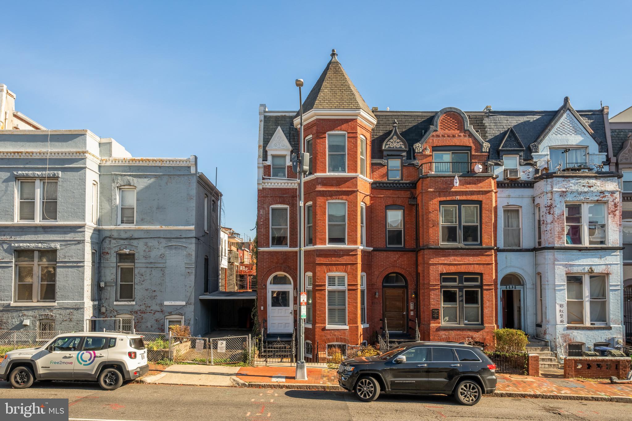 1135 6th Street Northwest, Unit 1 Washington, DC 20001 - Photo 1 of 33 a car parked in front of a houses
