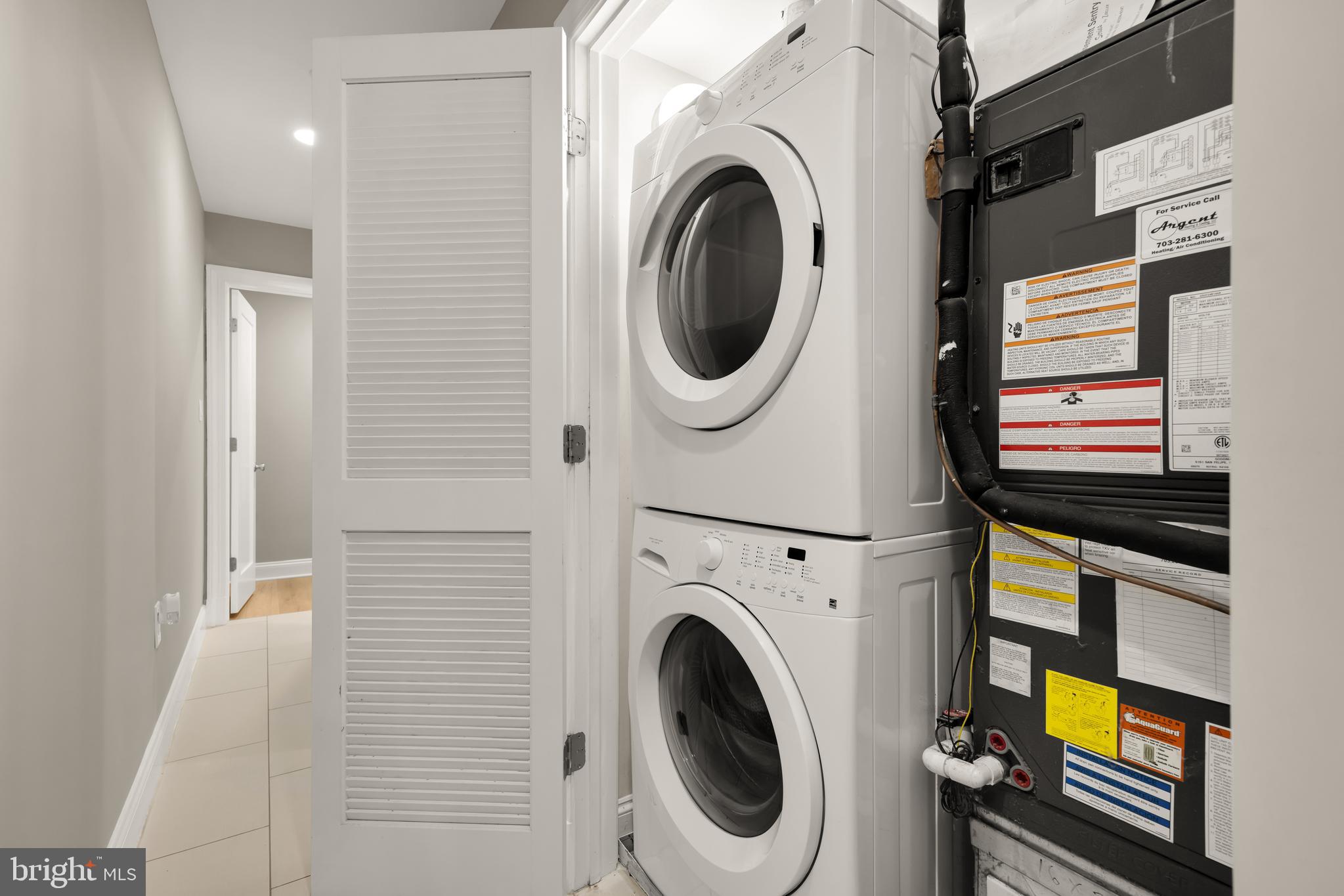 1135 6th Street Northwest, Unit 1 Washington, DC 20001 - Photo 20 of 33 a view of a storage & utility room with a washer dryer