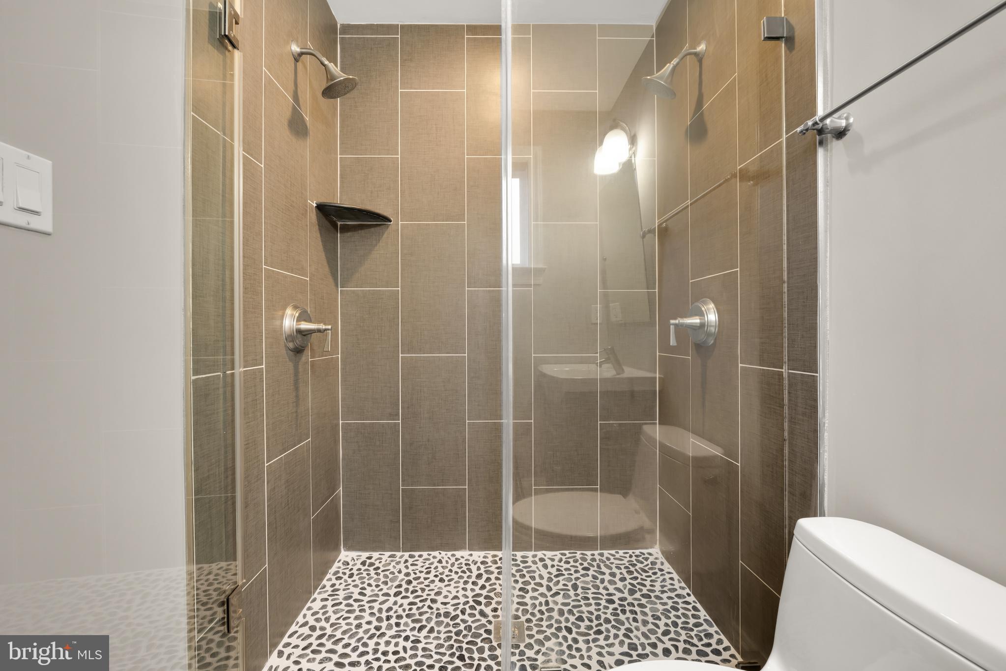 1135 6th Street Northwest, Unit 1 Washington, DC 20001 - Photo 29 of 33 a bathroom with a shower