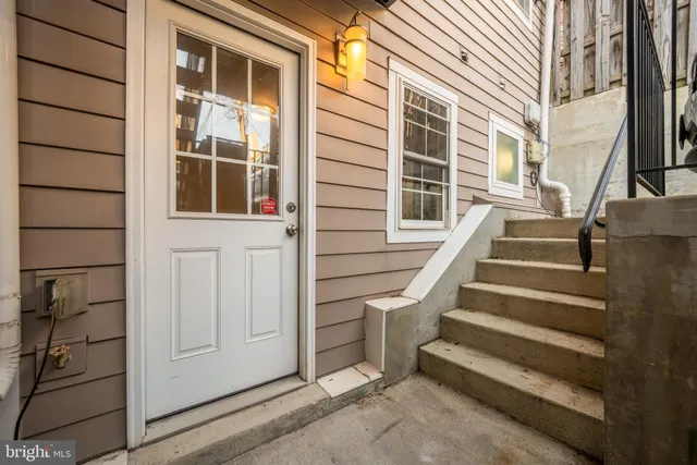 a view of entryway with a front door