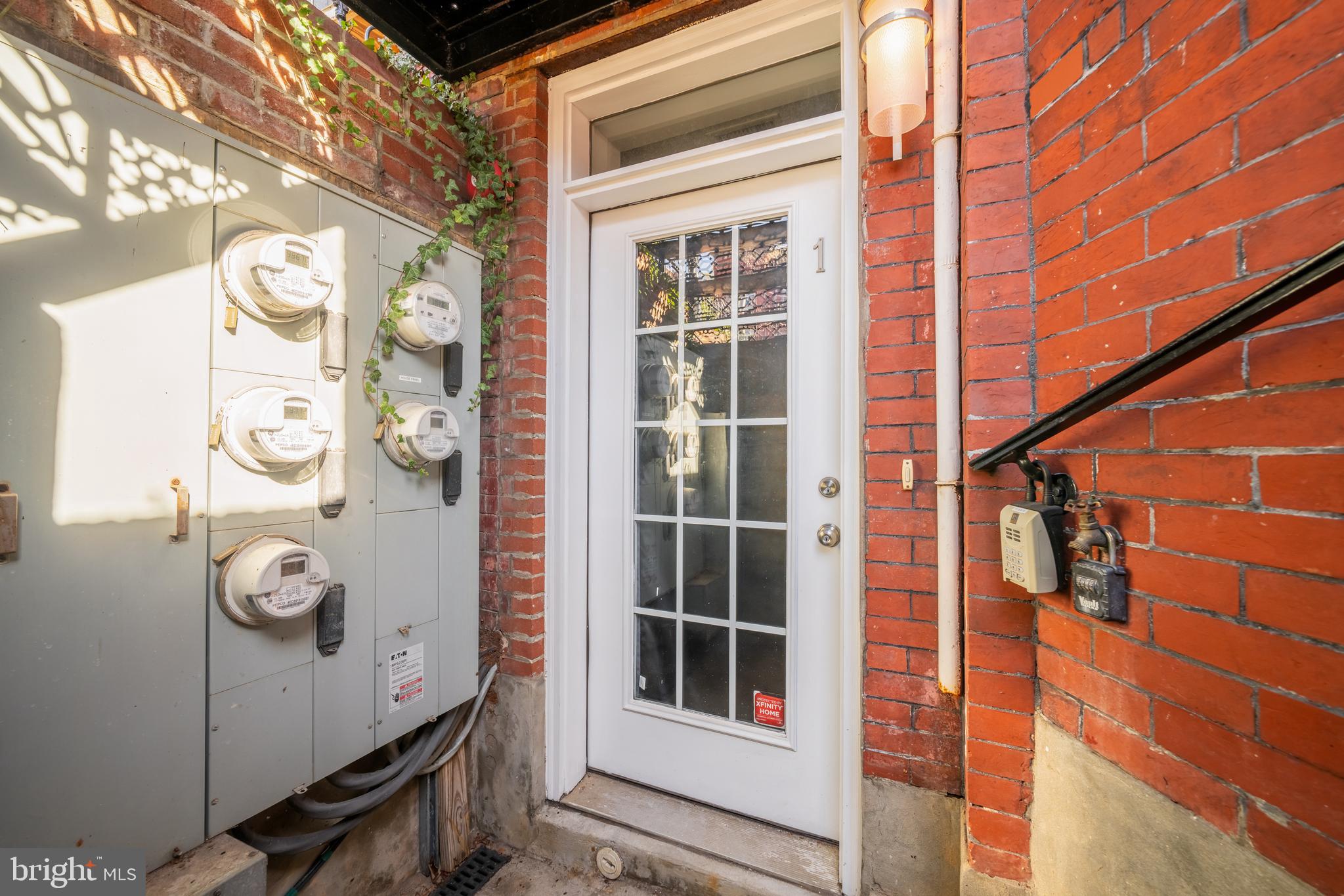 1135 6th Street Northwest, Unit 1 Washington, DC 20001 - Photo 33 of 33 a front view of a building with glass windows