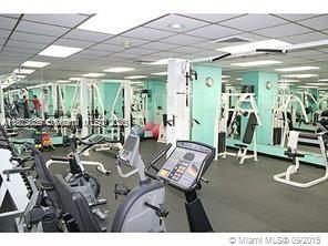 5255 Collins Avenue, Unit 4G Miami Beach, FL 33140 - Photo 21 of 30 a view of a room with gym equipment