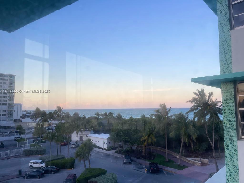 5255 Collins Avenue, Unit 4G Miami Beach, FL 33140 - Photo 22 of 30 a view of a city with lush green forest