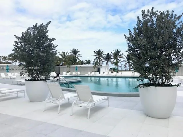 a view of a lake with patio