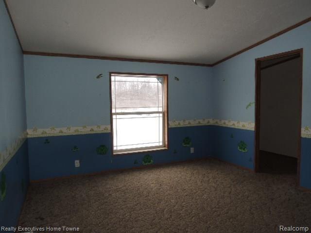 4600 Cade Road Capac, MI 48014 - Photo 12 of 17 Case # 261-919070 Bedroom 1.jpg