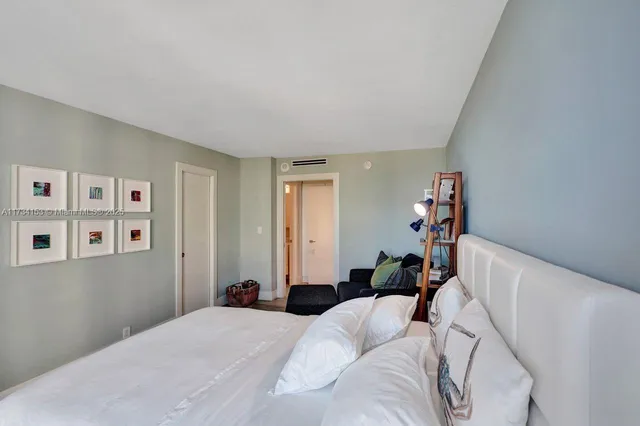 a utility room with closet dryer and washer