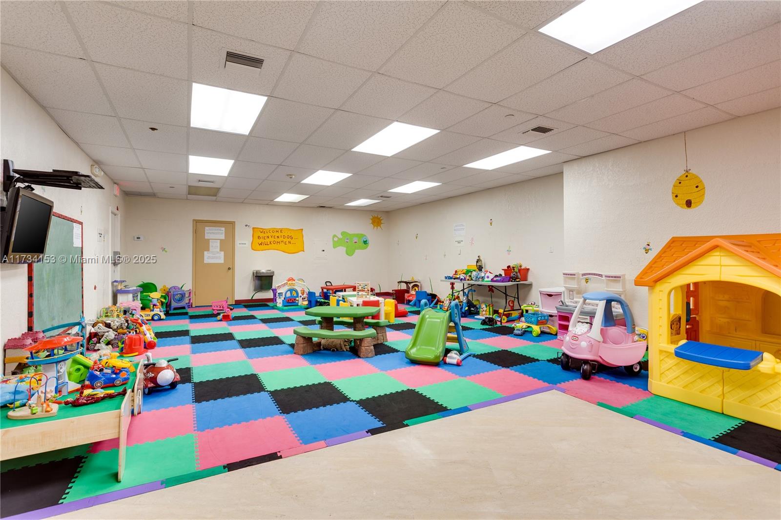 1121 Crandon Boulevard, Unit D706 Key Biscayne, FL 33149 - Photo 41 of 47 a play room with toys and a play ground
