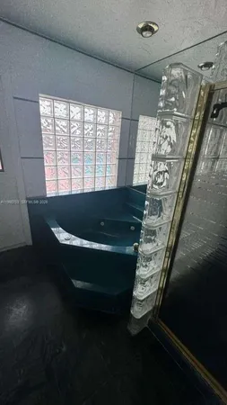 a room with table and chairs