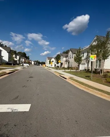 a view of a building with a street