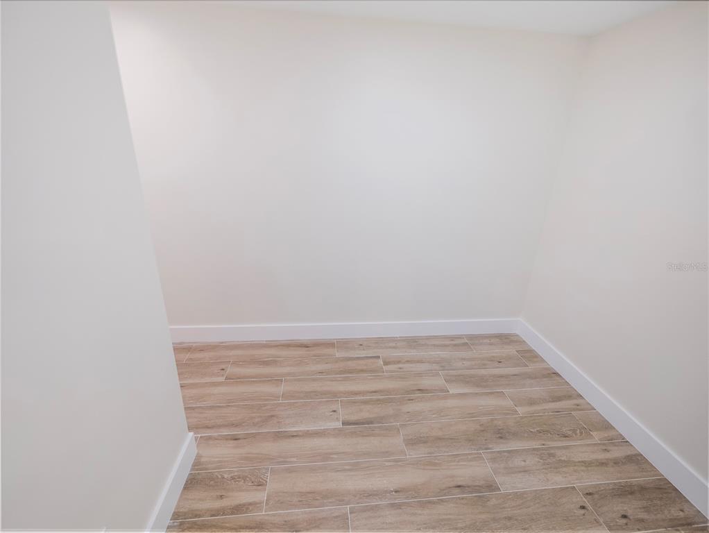 6790 Edgeworth Drive Orlando, FL 32819 - Photo 32 of 57 a view of a small space