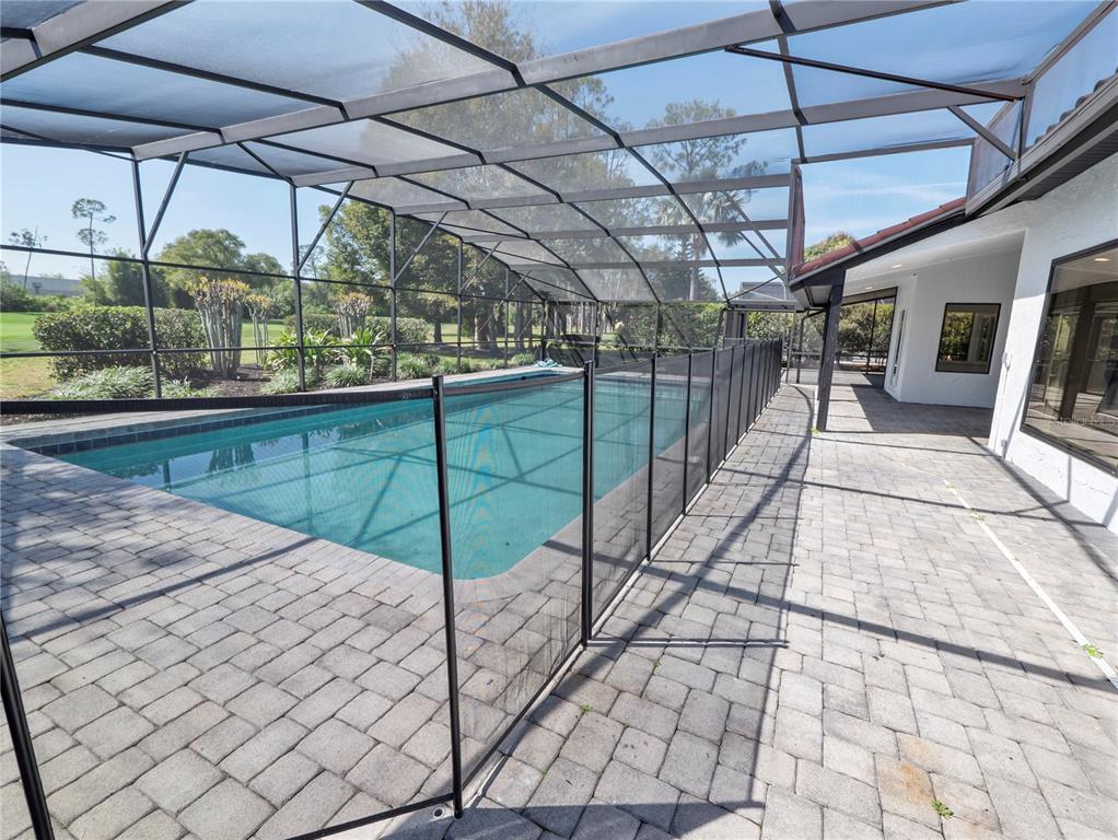 6790 Edgeworth Drive Orlando, FL 32819 - Photo 40 of 57 a view of a backyard with sitting area