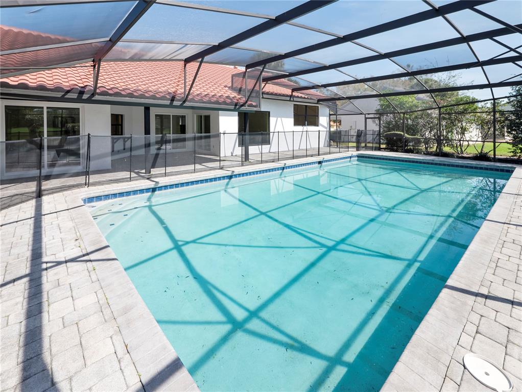 6790 Edgeworth Drive Orlando, FL 32819 - Photo 43 of 57 a view of a backyard with sitting area