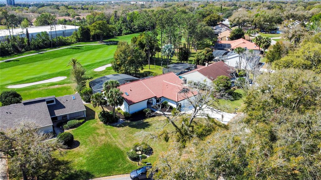 6790 Edgeworth Drive Orlando, FL 32819 - Photo 54 of 57 an aerial view of a house with yard swimming pool and outdoor seating