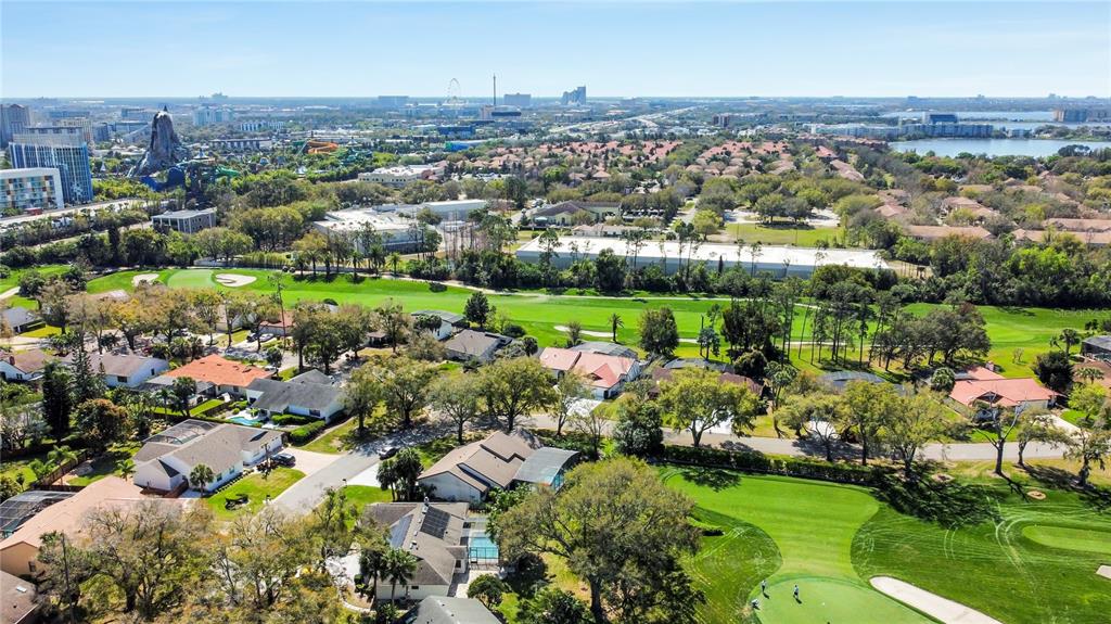 6790 Edgeworth Drive Orlando, FL 32819 - Photo 56 of 57 an aerial view of a houses with a lake view