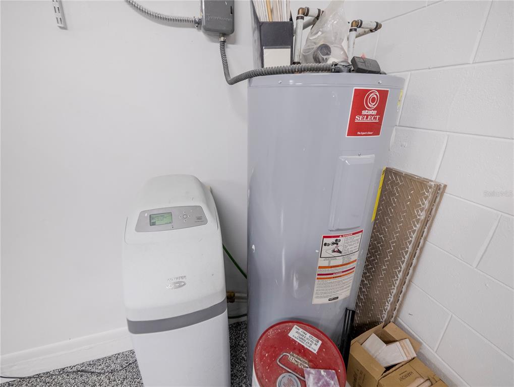 6790 Edgeworth Drive Orlando, FL 32819 - Photo 57 of 57 a utility room with dryer and washer