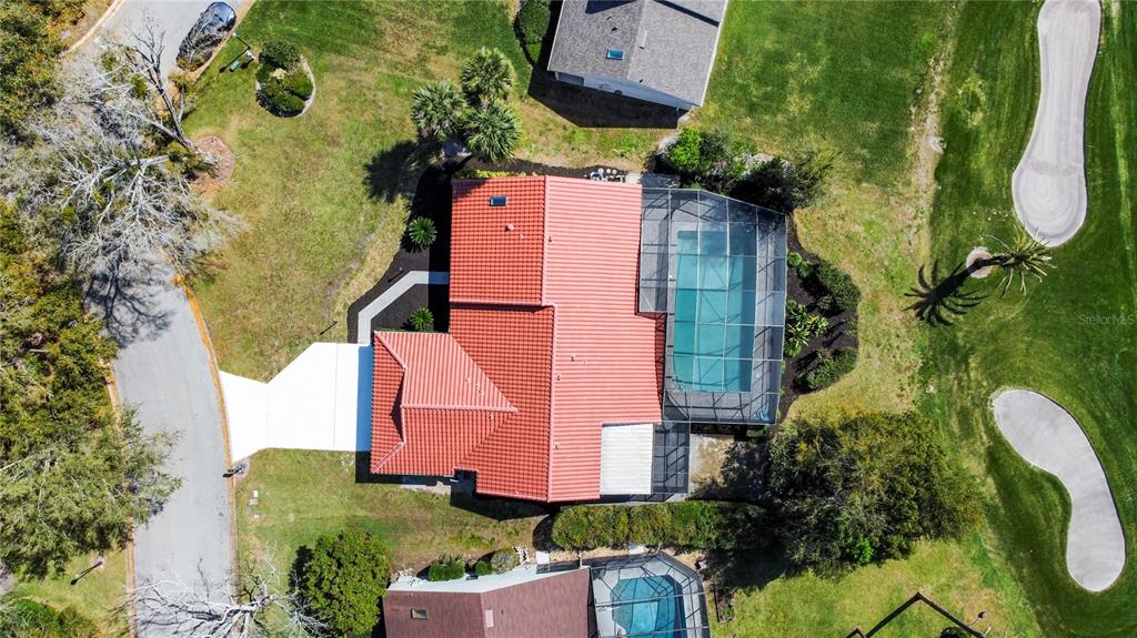 6790 Edgeworth Drive Orlando, FL 32819 - Photo 6 of 57 an aerial view of a house with a yard basket ball court and outdoor seating