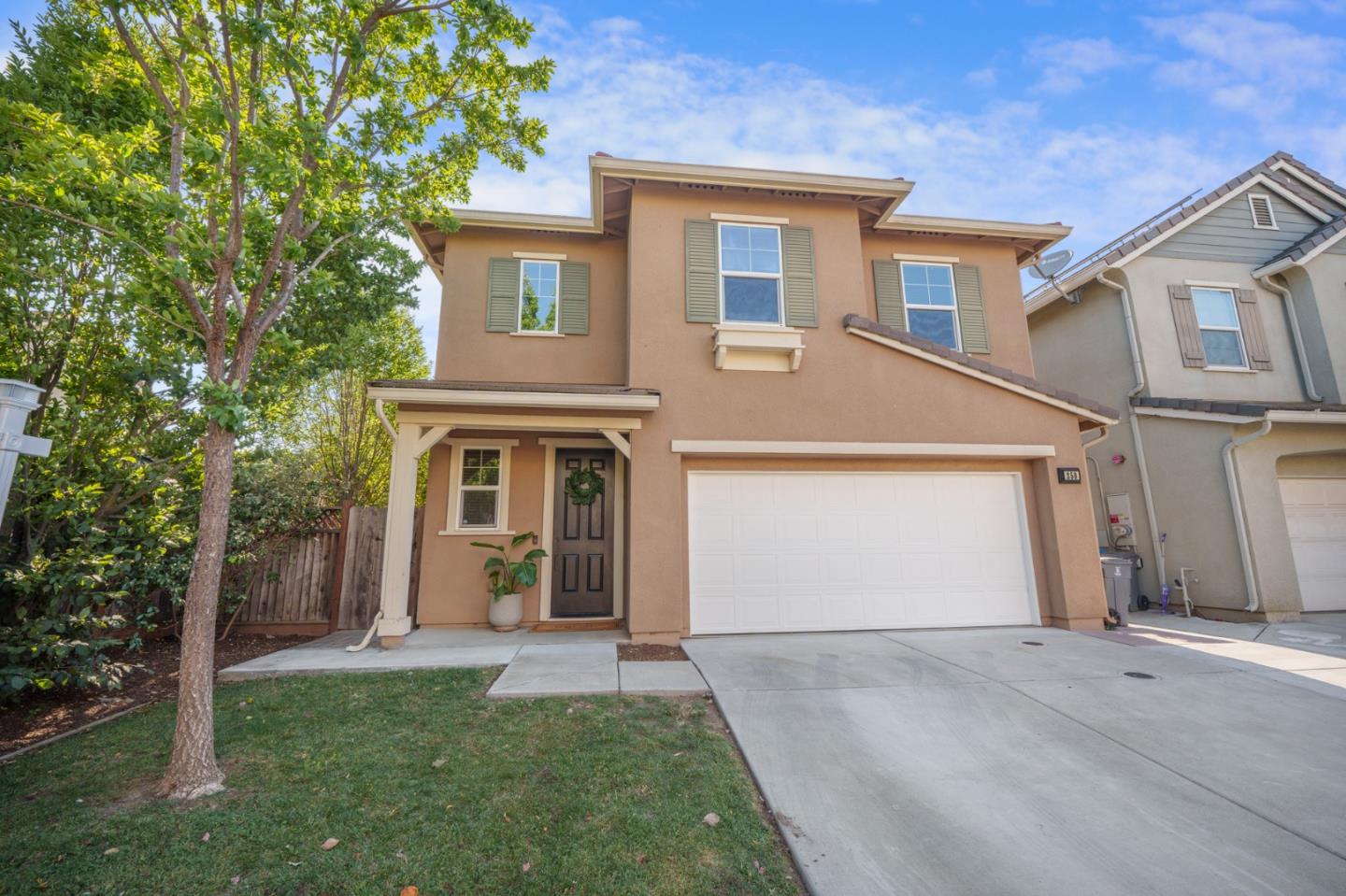 a view of a yard in front of a house