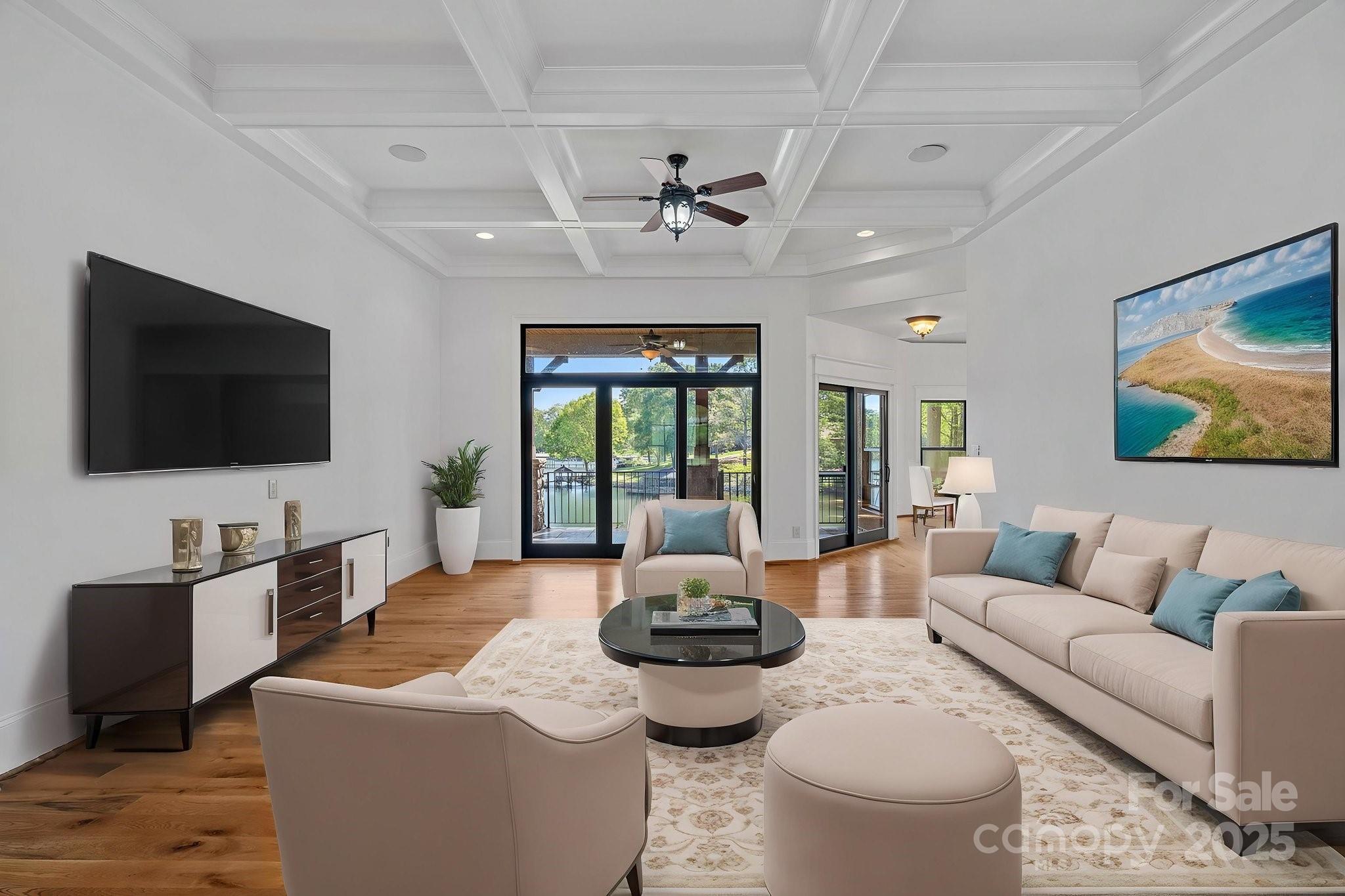 4786 Heather Lane Denver, NC 28037 - Photo 11 of 48 a living room with furniture and a flat screen tv