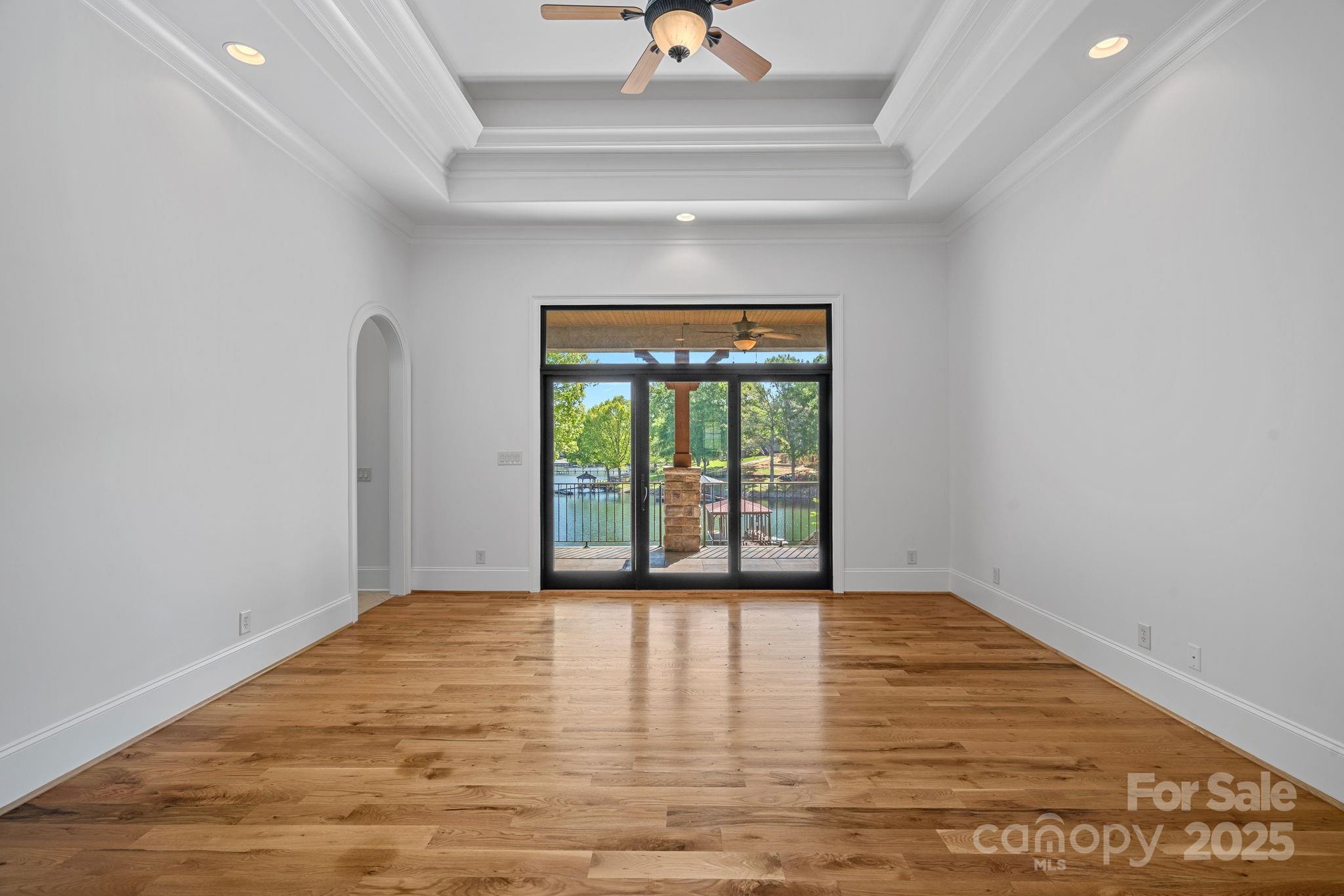 4786 Heather Lane Denver, NC 28037 - Photo 19 of 48 a view of an empty room with glass door