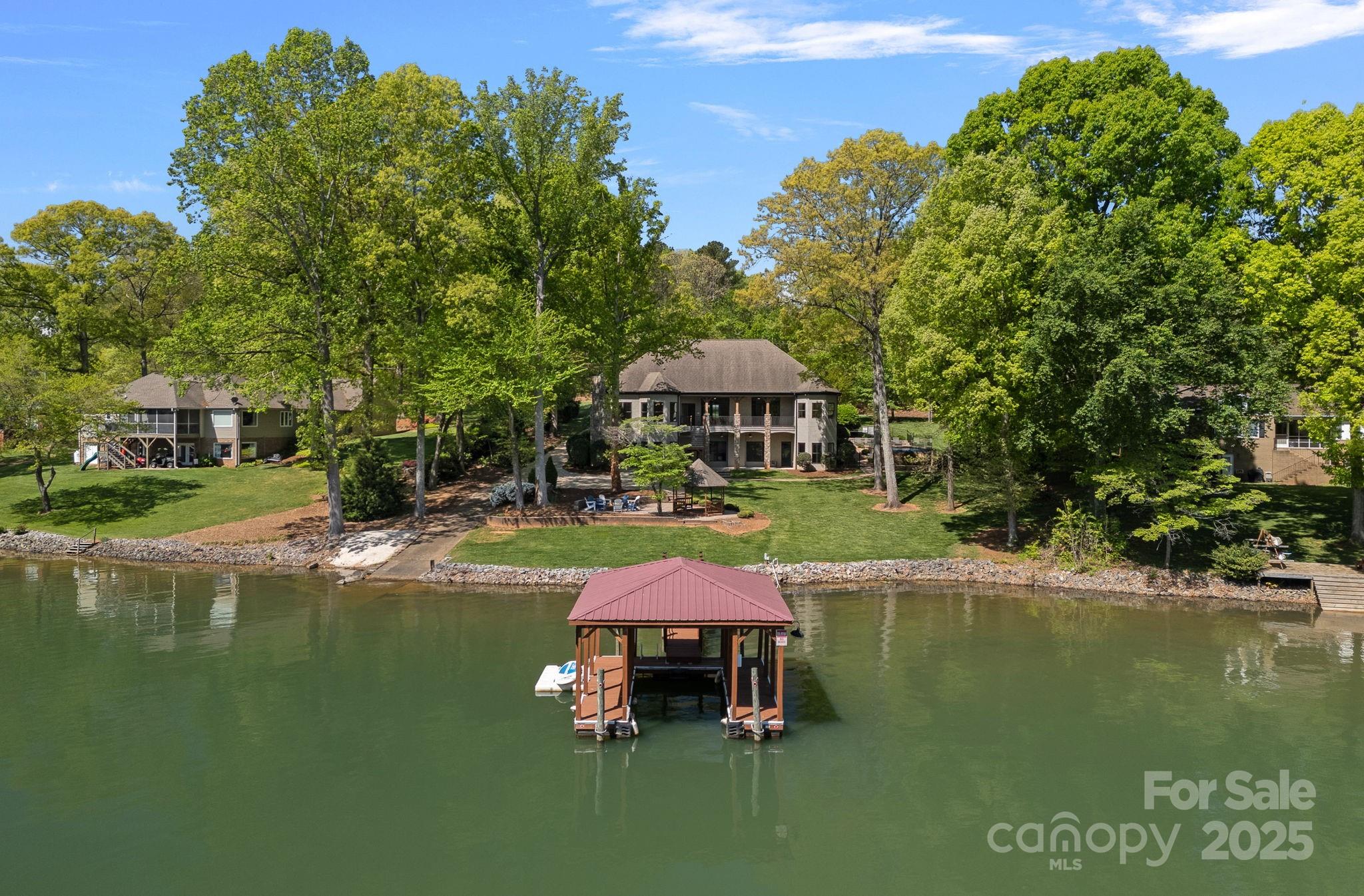 4786 Heather Lane Denver, NC 28037 - Photo 2 of 48 a swimming pool with outdoor seating and yard