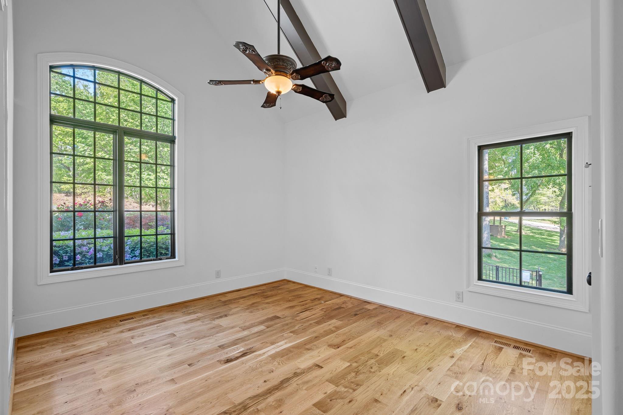 4786 Heather Lane Denver, NC 28037 - Photo 23 of 48 a view of empty room with windows