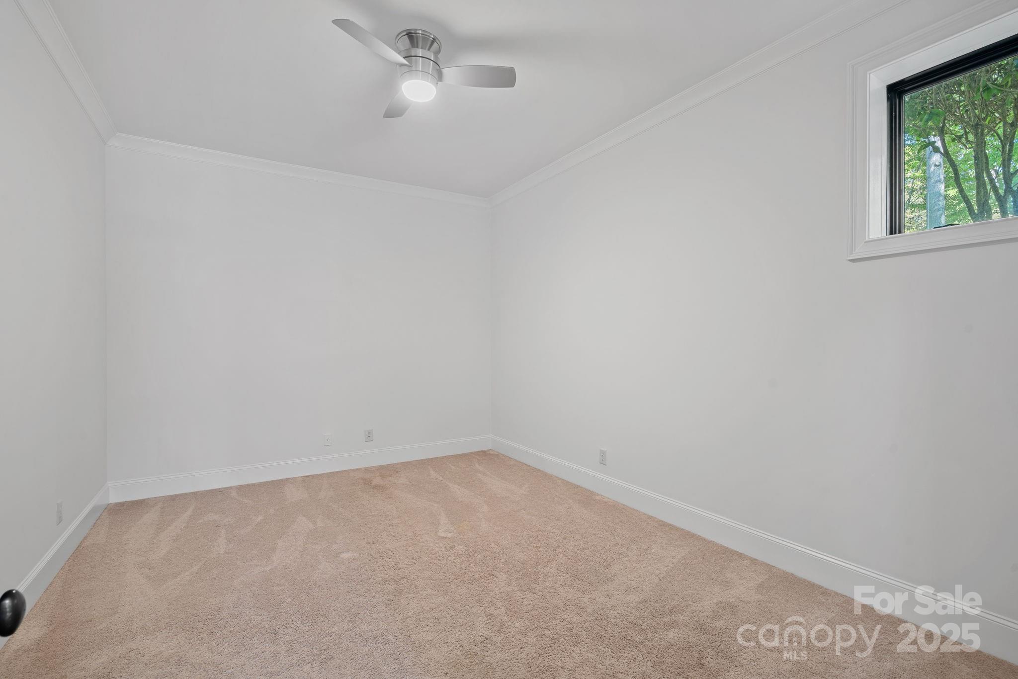 4786 Heather Lane Denver, NC 28037 - Photo 31 of 48 an empty room with a window