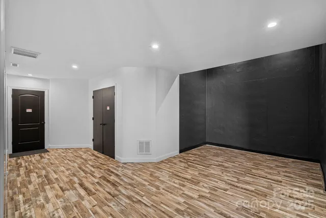 a view of staircase with wooden fence