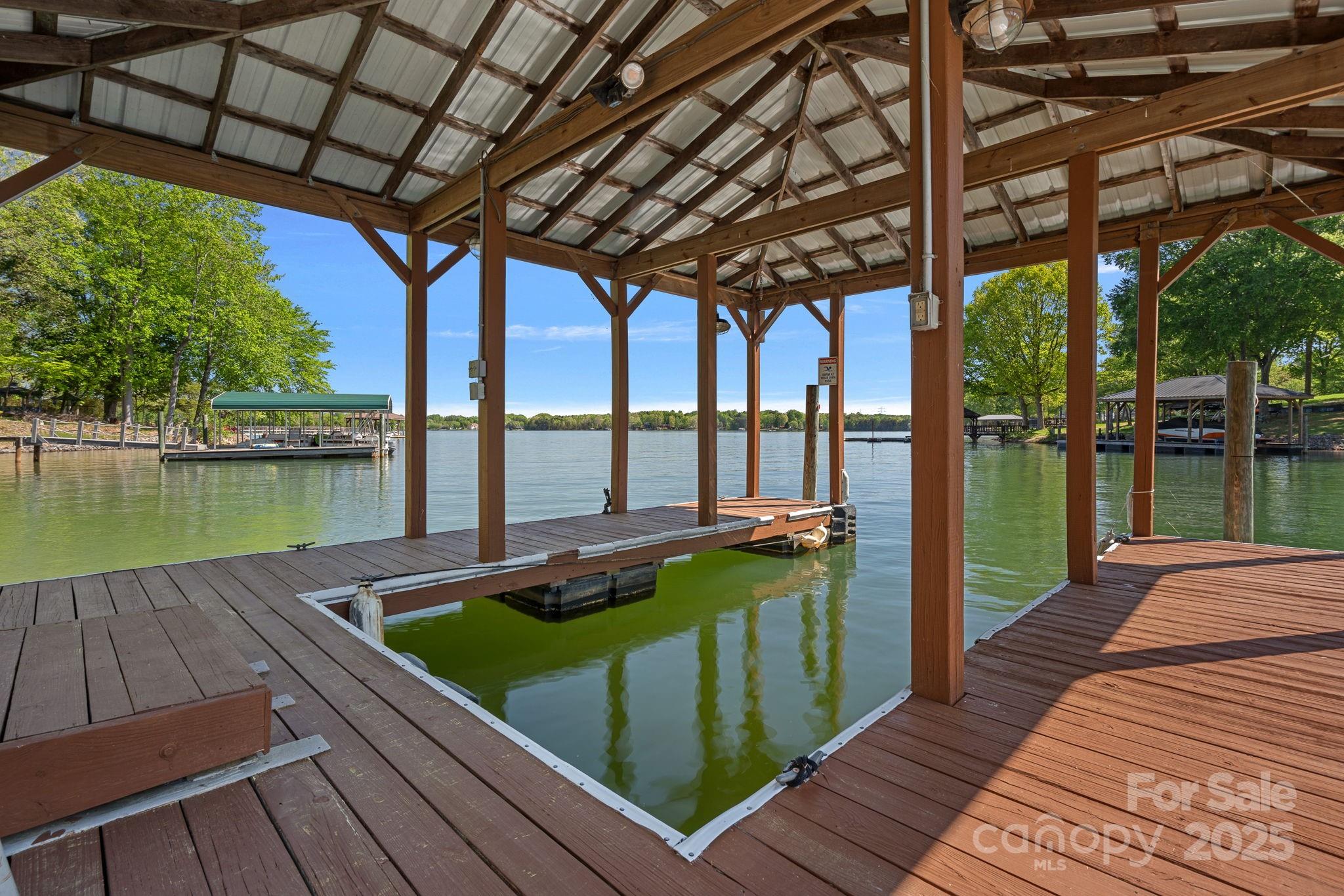 4786 Heather Lane Denver, NC 28037 - Photo 44 of 48 a view of a swimming pool with a patio