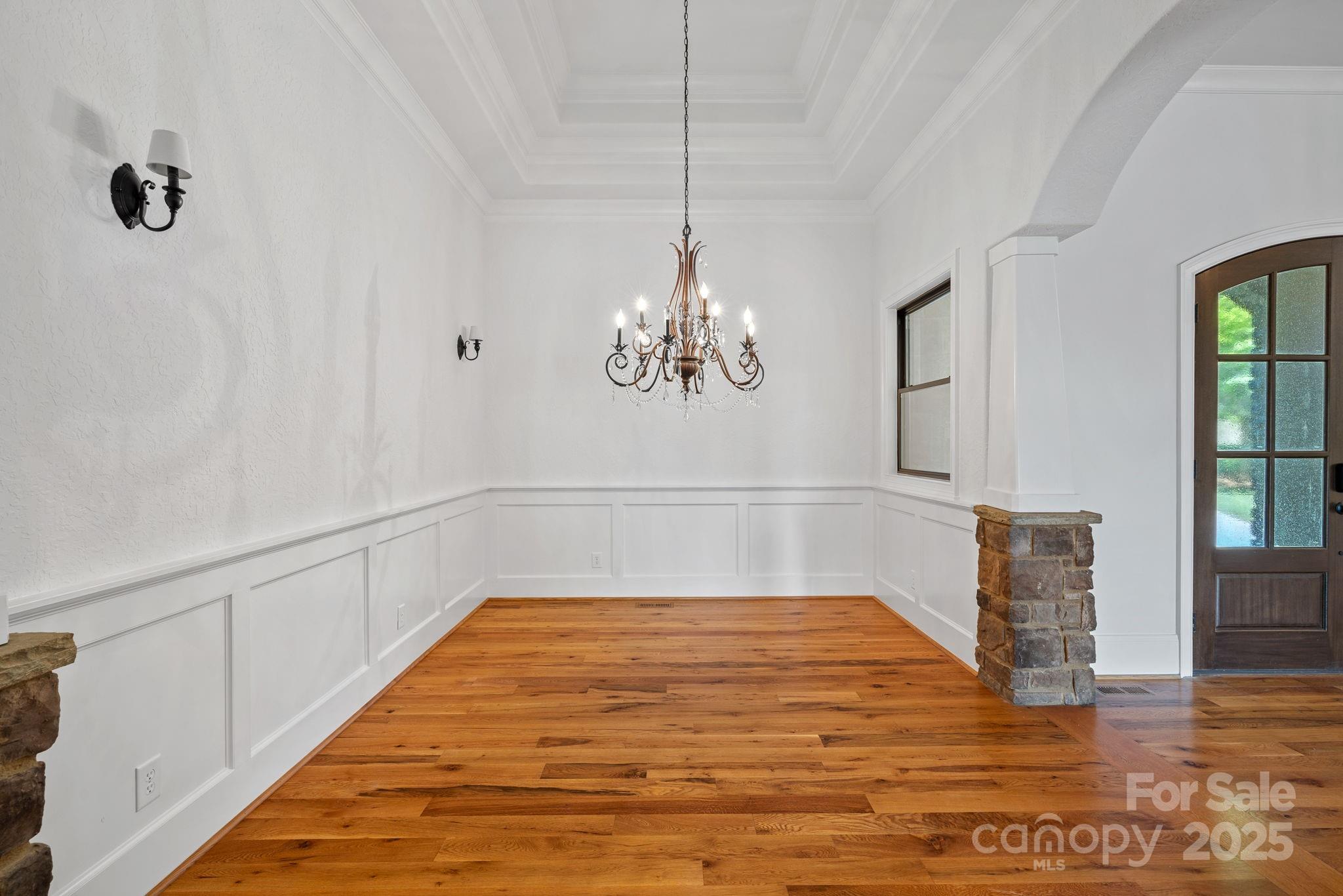 4786 Heather Lane Denver, NC 28037 - Photo 8 of 48 a view of empty room with wooden floor and fan