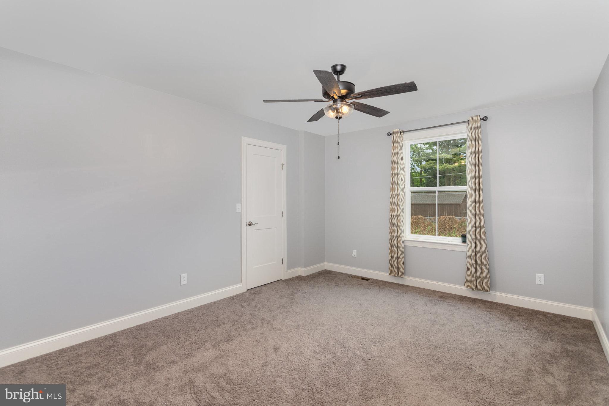 309 Pierson Road Lititz, PA 17543 - Photo 15 of 24 wooden floor in an empty room with a window