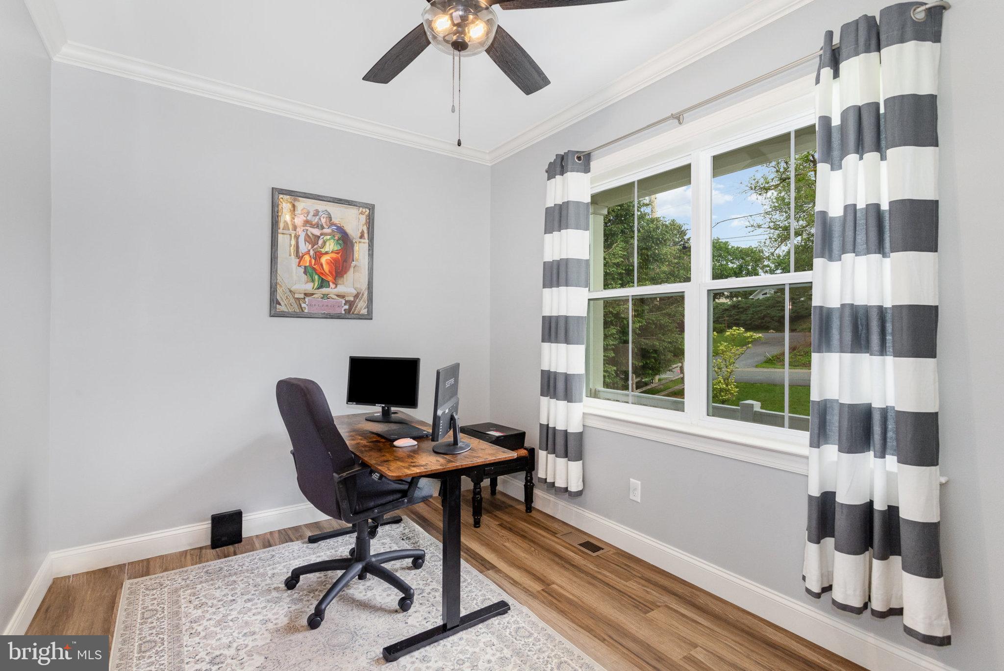 309 Pierson Road Lititz, PA 17543 - Photo 9 of 24 a workspace with furniture hardwood and a window