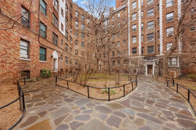 a view of a pathway both side of building