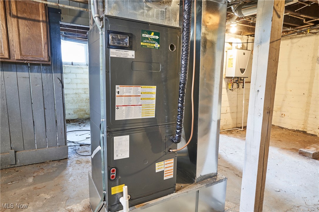 2152 Middlefield Road Cleveland, OH 44106 - Photo 42 of 50 Utilities featuring heating unit and water heater