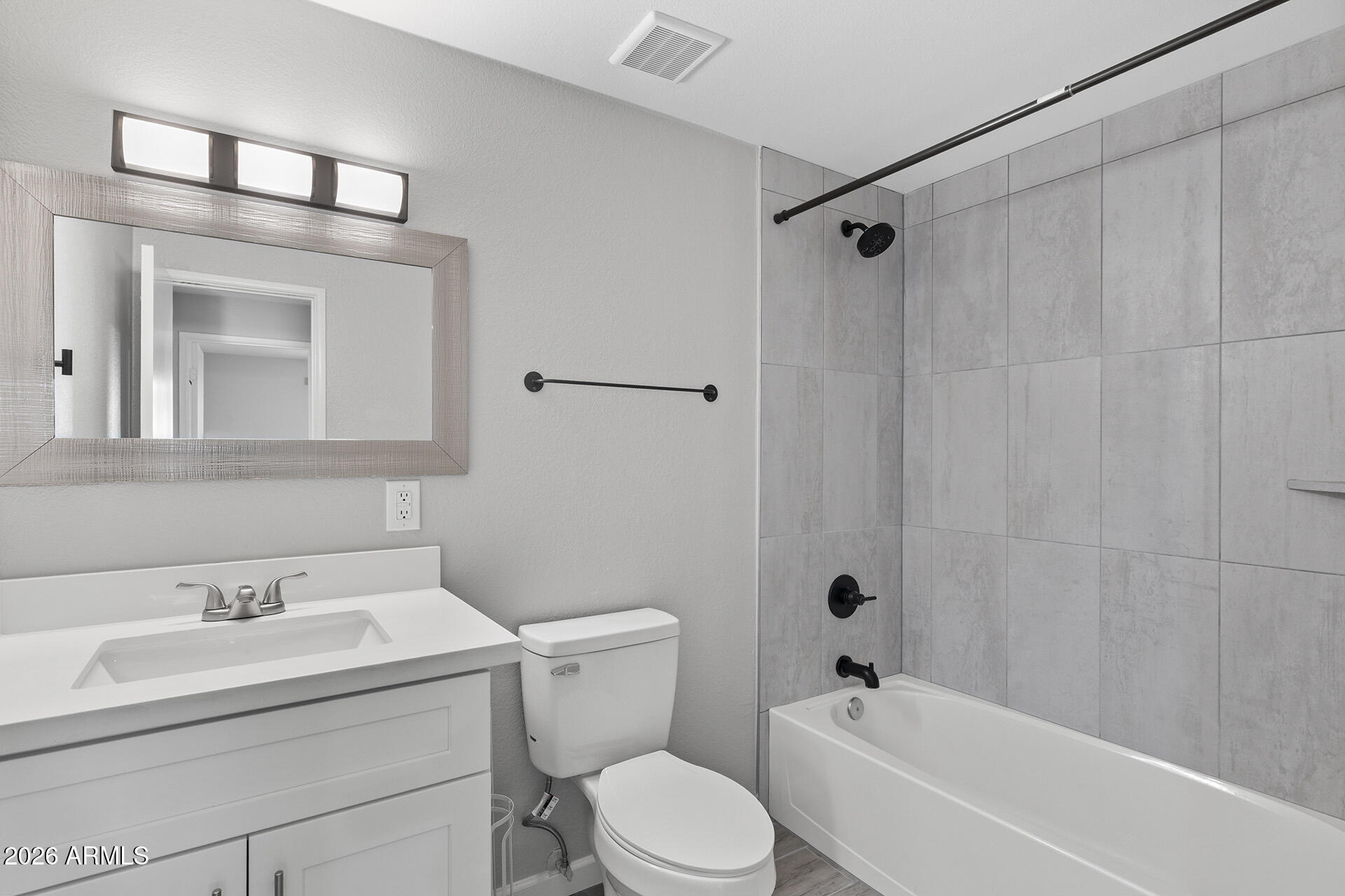 3749 East Pershing Avenue Phoenix, AZ 85032 - Photo 31 of 53 a bathroom with a sink toilet and shower