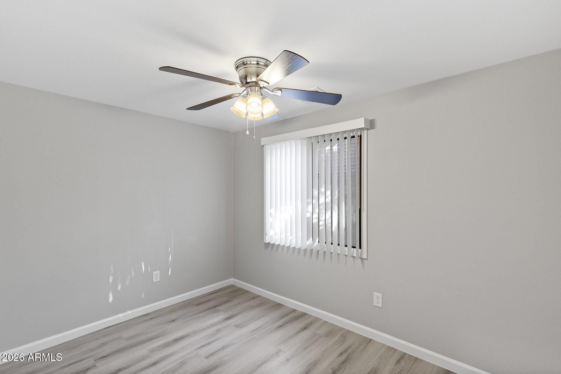 3749 East Pershing Avenue Phoenix, AZ 85032 - Photo 32 of 53 a view of an empty room with a window