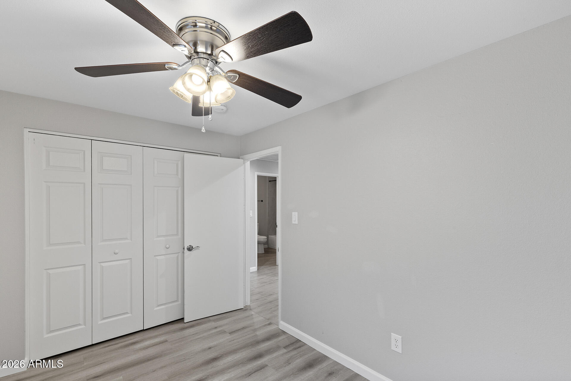 3749 East Pershing Avenue Phoenix, AZ 85032 - Photo 33 of 53 wooden floor in an empty room