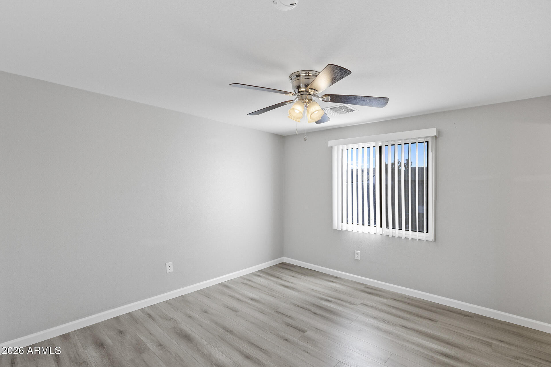 3749 East Pershing Avenue Phoenix, AZ 85032 - Photo 37 of 53 a view of an empty room with a window