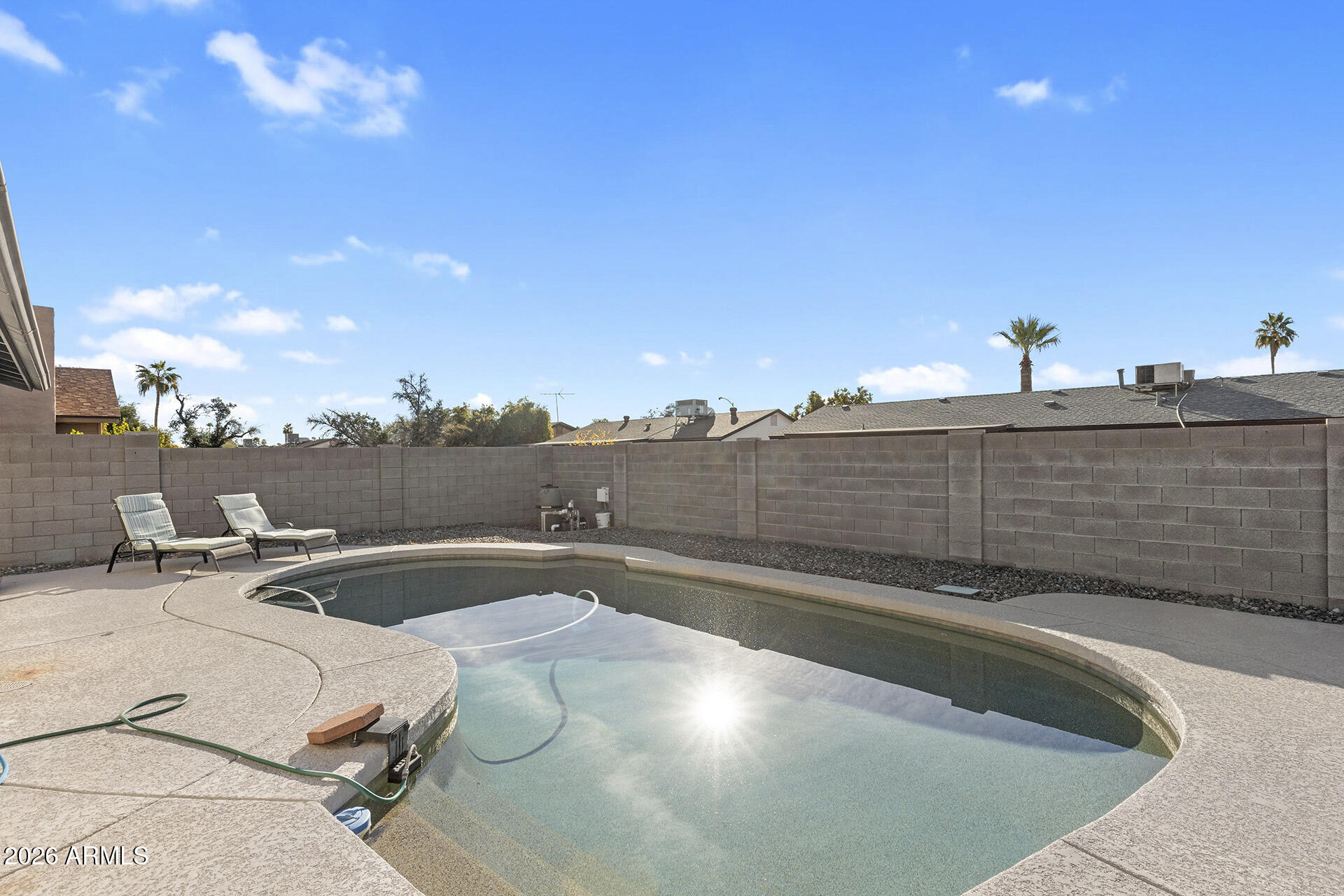 3749 East Pershing Avenue Phoenix, AZ 85032 - Photo 43 of 53 a view of a swimming pool with a terrace