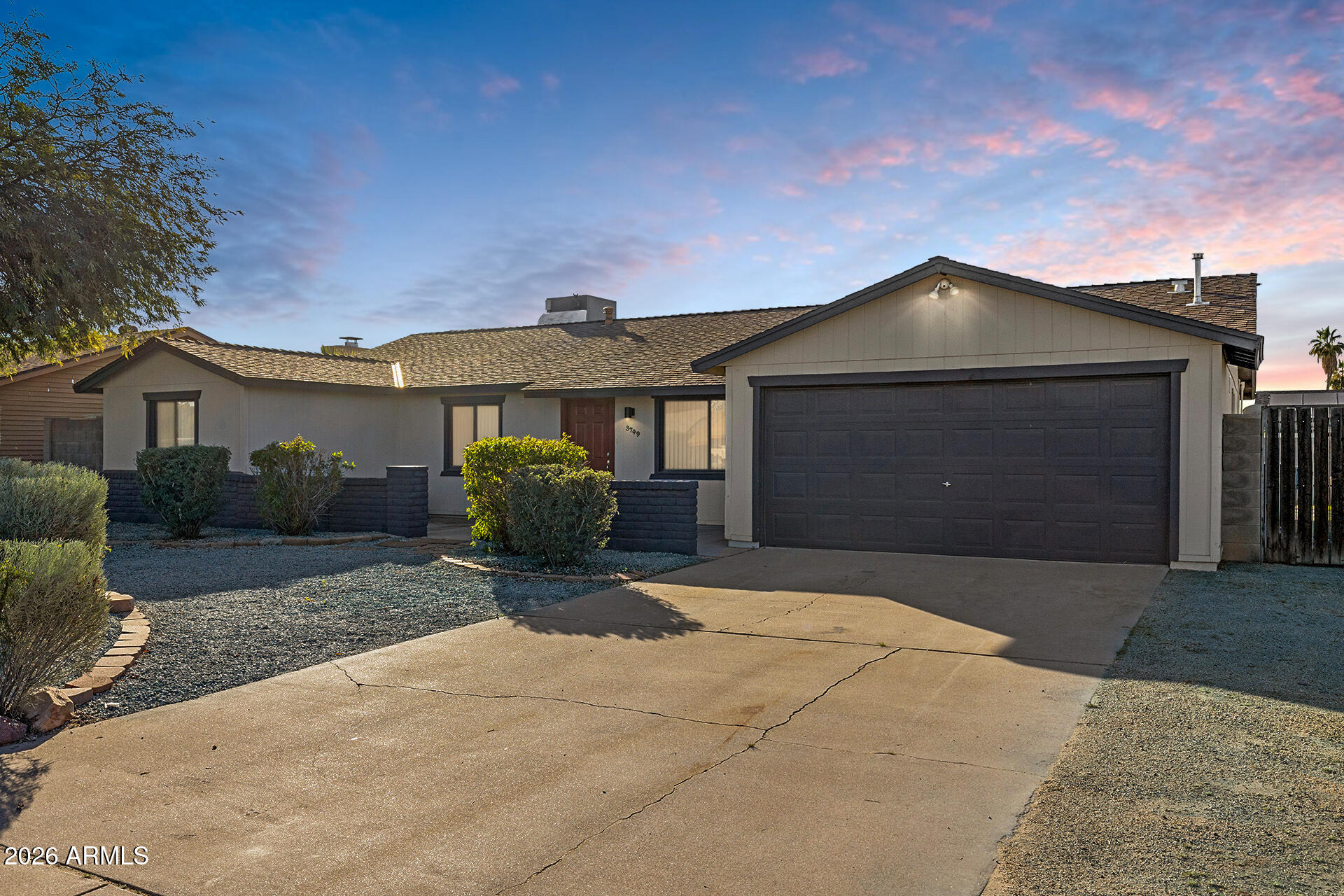 3749 East Pershing Avenue Phoenix, AZ 85032 - Photo 47 of 53 a front view of a house with a yard