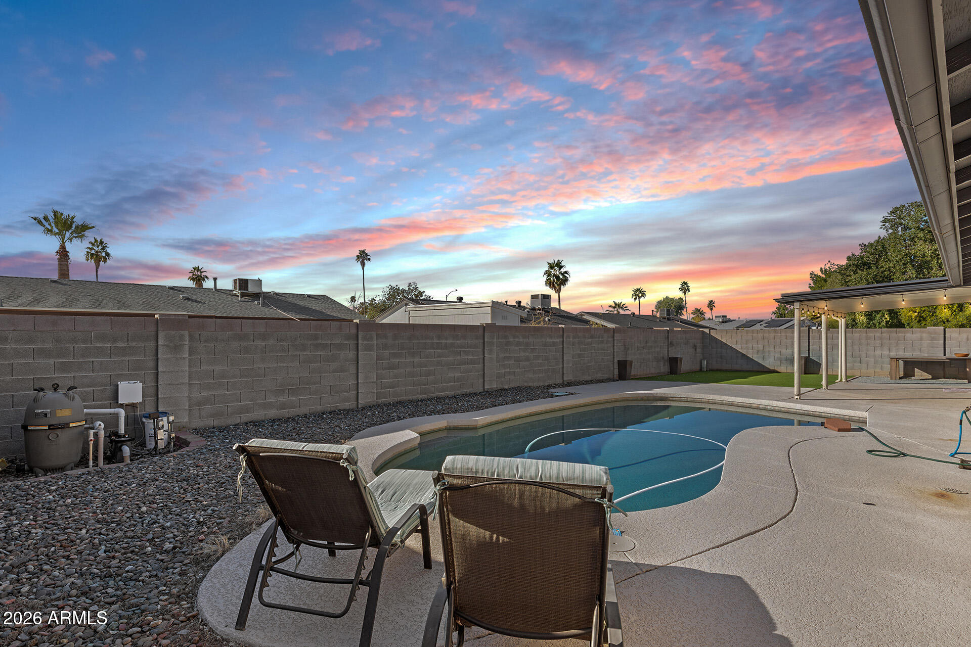 3749 East Pershing Avenue Phoenix, AZ 85032 - Photo 48 of 53 a view of a chairs and table on the terrace