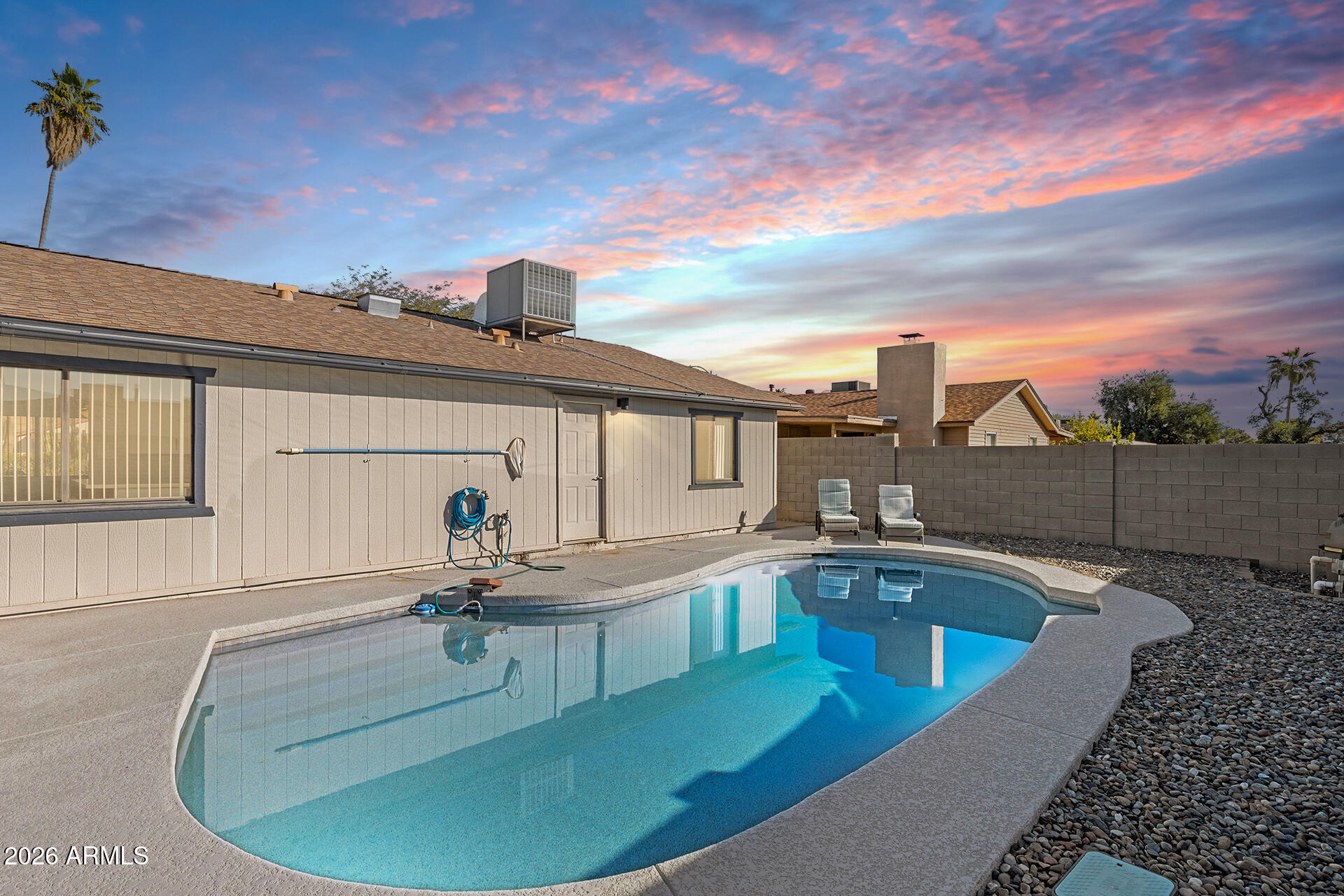 3749 East Pershing Avenue Phoenix, AZ 85032 - Photo 50 of 53 a view of a swimming pool with a patio