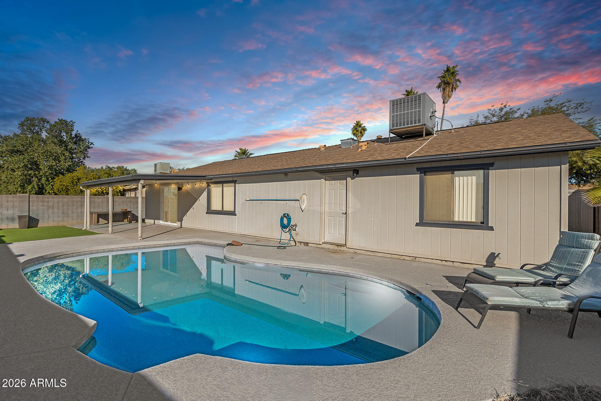 3749 East Pershing Avenue Phoenix, AZ 85032 - Photo 6 of 53 a view of a house with pool and chairs